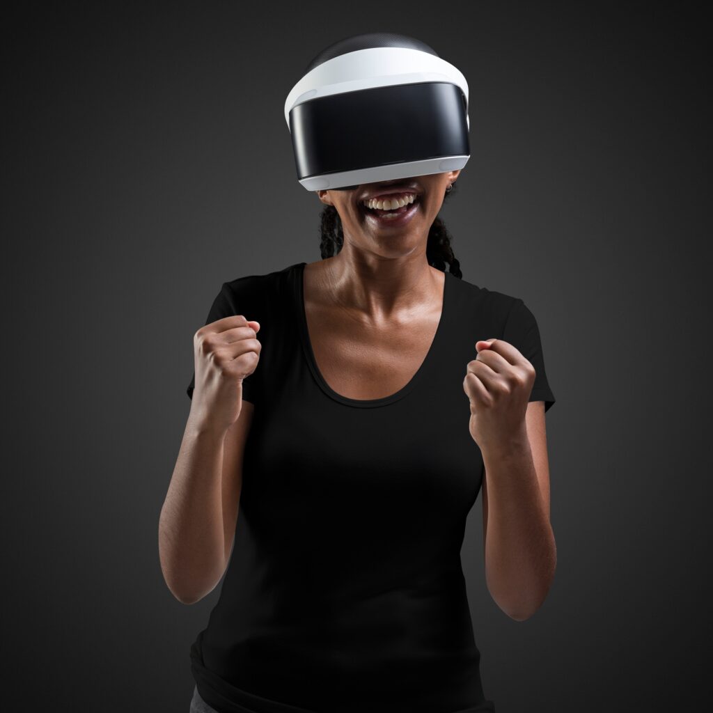African American woman having virtual reality experience using VR headset