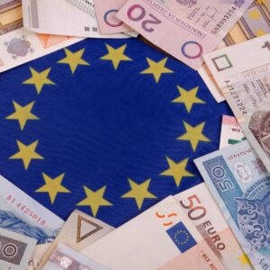 Banknotes Polish zlotys and Euros are on the heap. On the European Union flag background. Square.