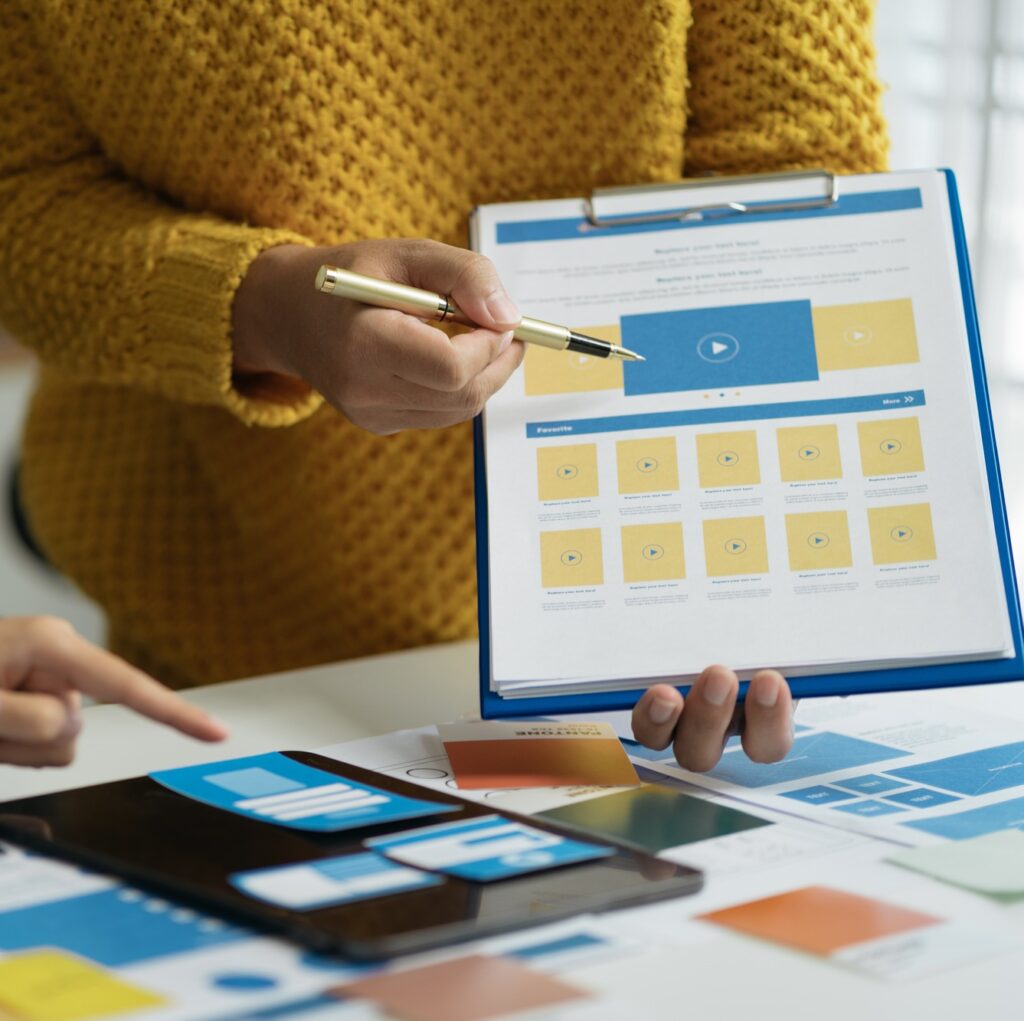 Creative team web designer planning application development for web