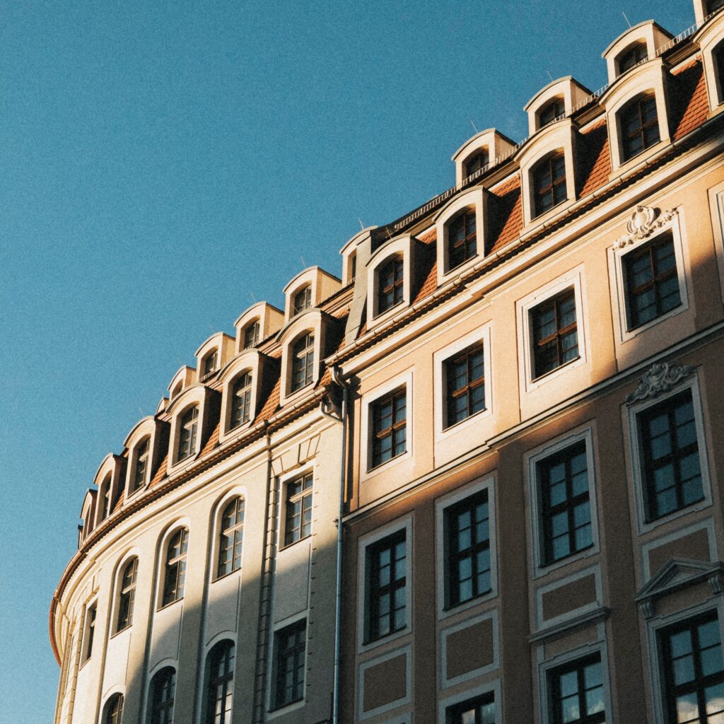 Classic European apartment building under the blue sky